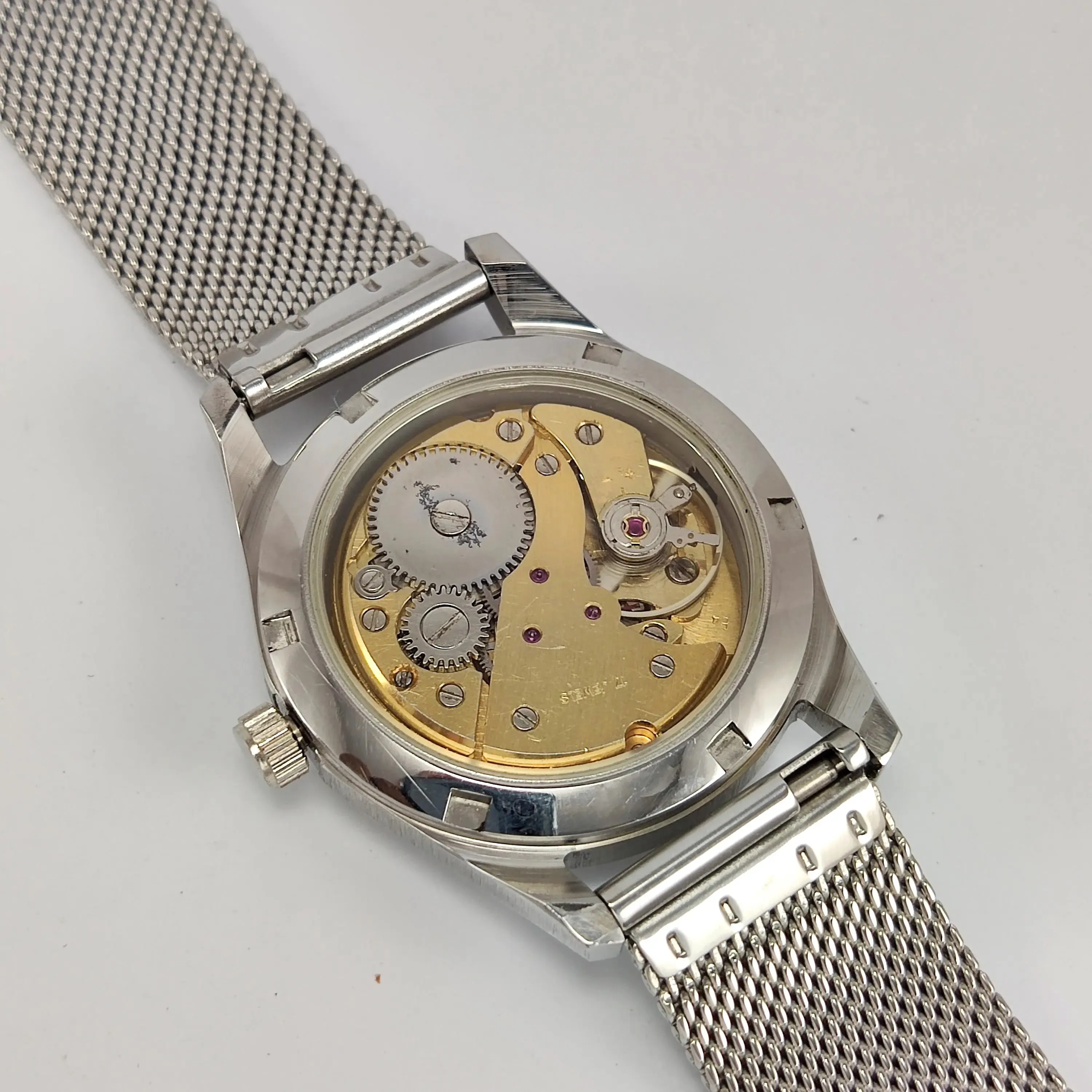 Melas Pearl Dial 17 Jewels Transparent Back Date Function